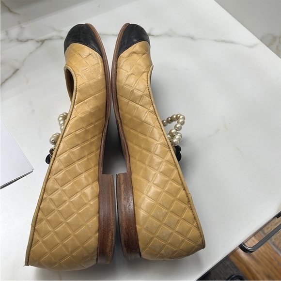 AUTHENTIC CHANEL Black and Tan Flats with Pearl Embellishments - Picture 9 of 13